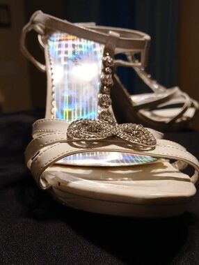Elegant White T-Strap Women's Sandals with Crystal Bow Accent